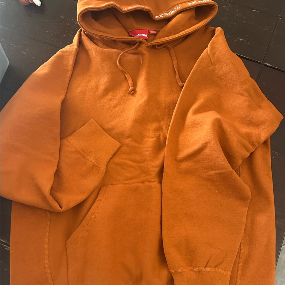 Supreme Rust Hoodie with White Accents